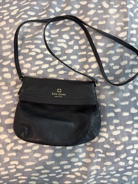 kate spade black pebbled leather crossbody with gold logo